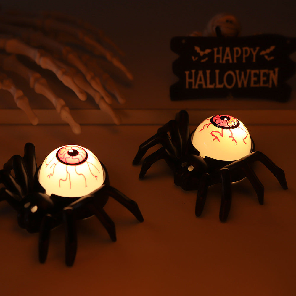 Spookachtige ontlichaamde oogbol en spiderlamptafel decoratie