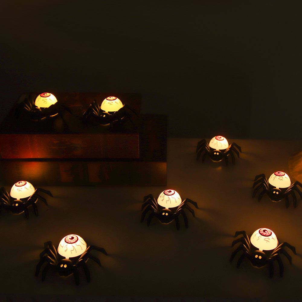 Spookachtige ontlichaamde oogbol en spiderlamptafel decoratie