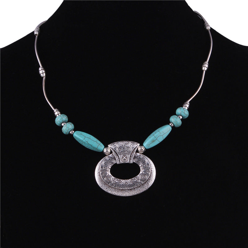 Ornate Oval and Turquoise Necklace