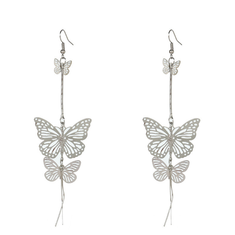 Aretes colgantes de metal con doble mariposa