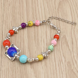 Bracelet en métal perlé coloré